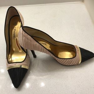 Black and gold pointed toe heels